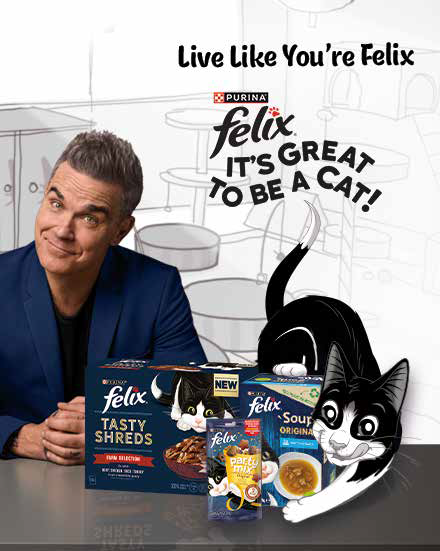 Robbie Williams ja Felix ümbritsetuna Felixi kassitoitude valikust